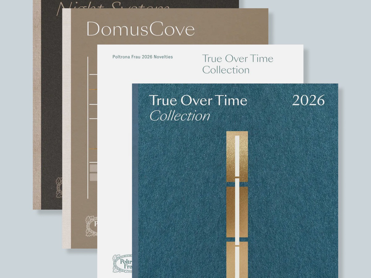A stack of Poltrona Frau catalogs, including DomusCove and the True Over Time Collection.