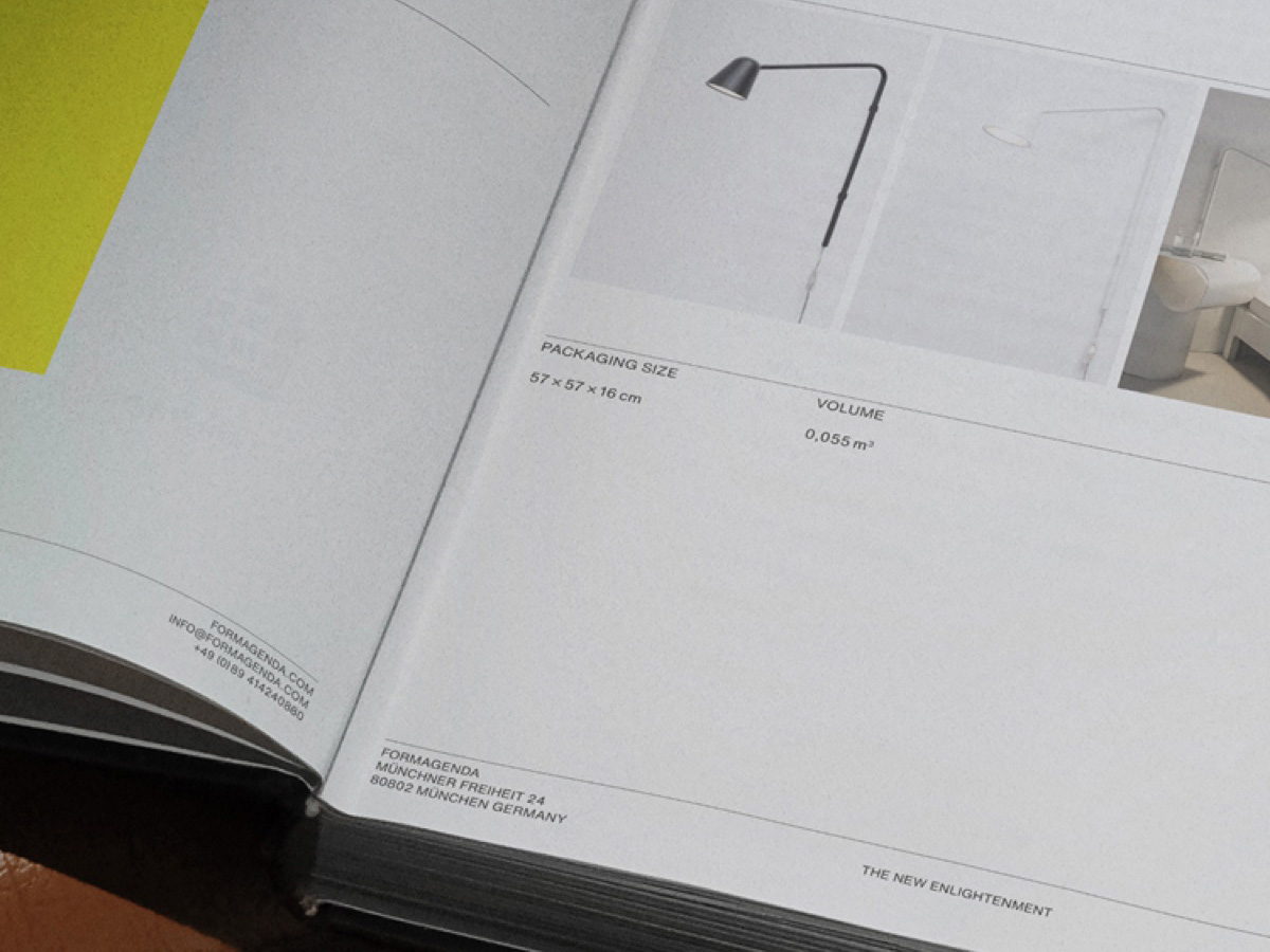 A catalog spread showing a lamp's packaging size and volume specifications.